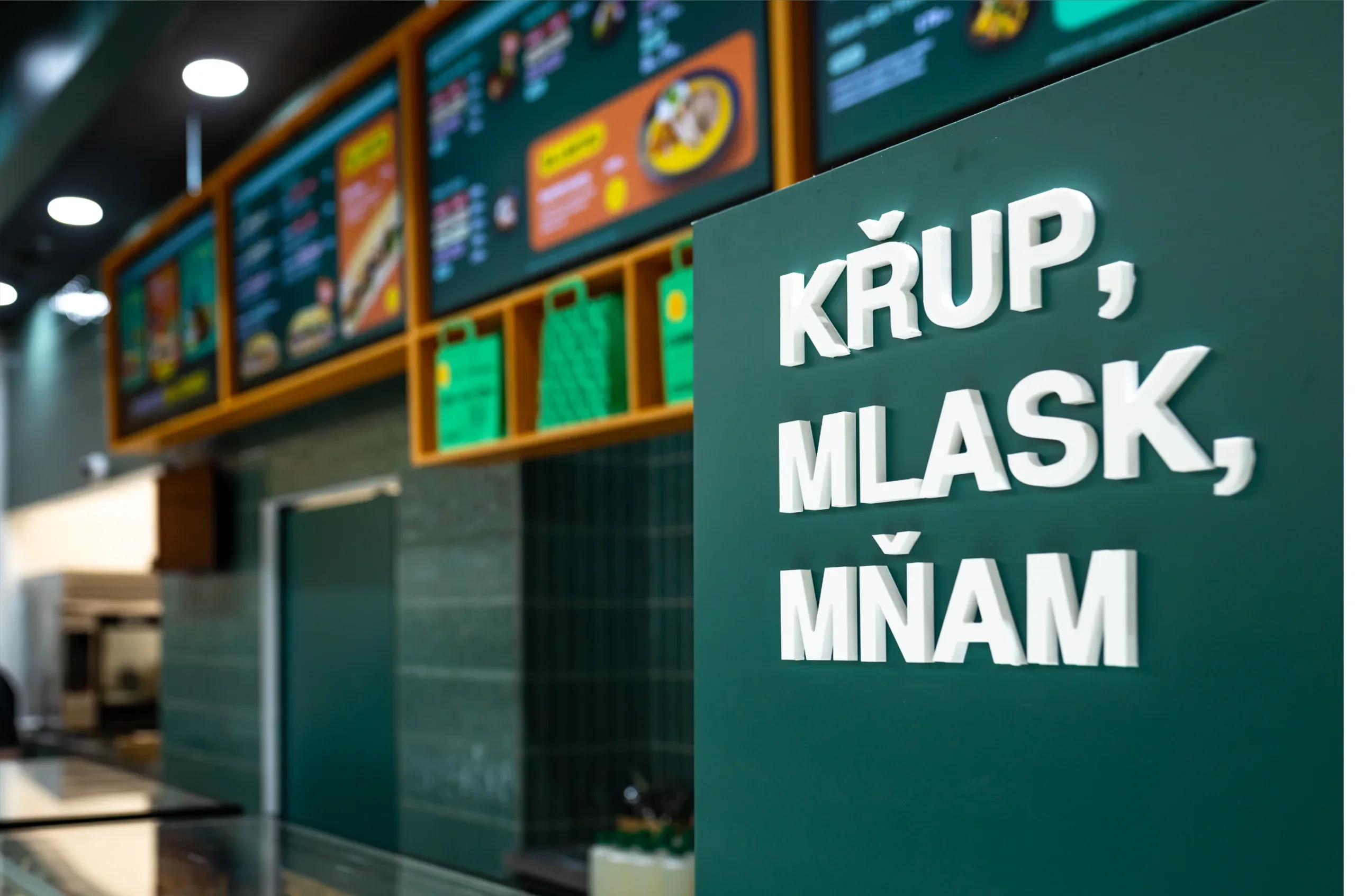 Menu boards and the Křup, mlask, mňam sign