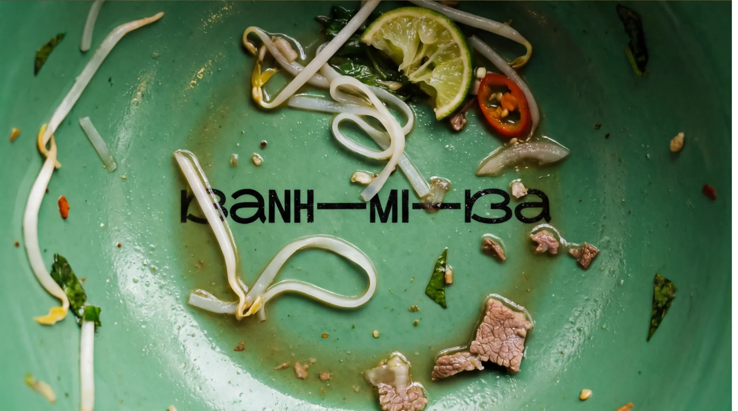 Pho bowl with the wordmark
