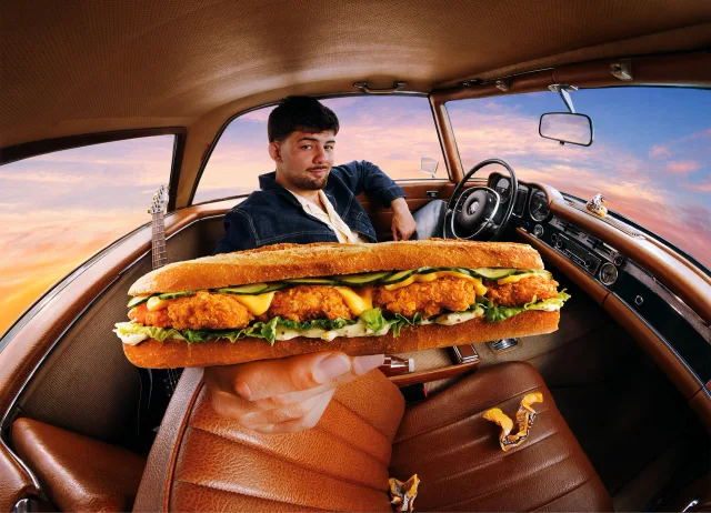 Singer Calin with the Chick Star baguette in a car