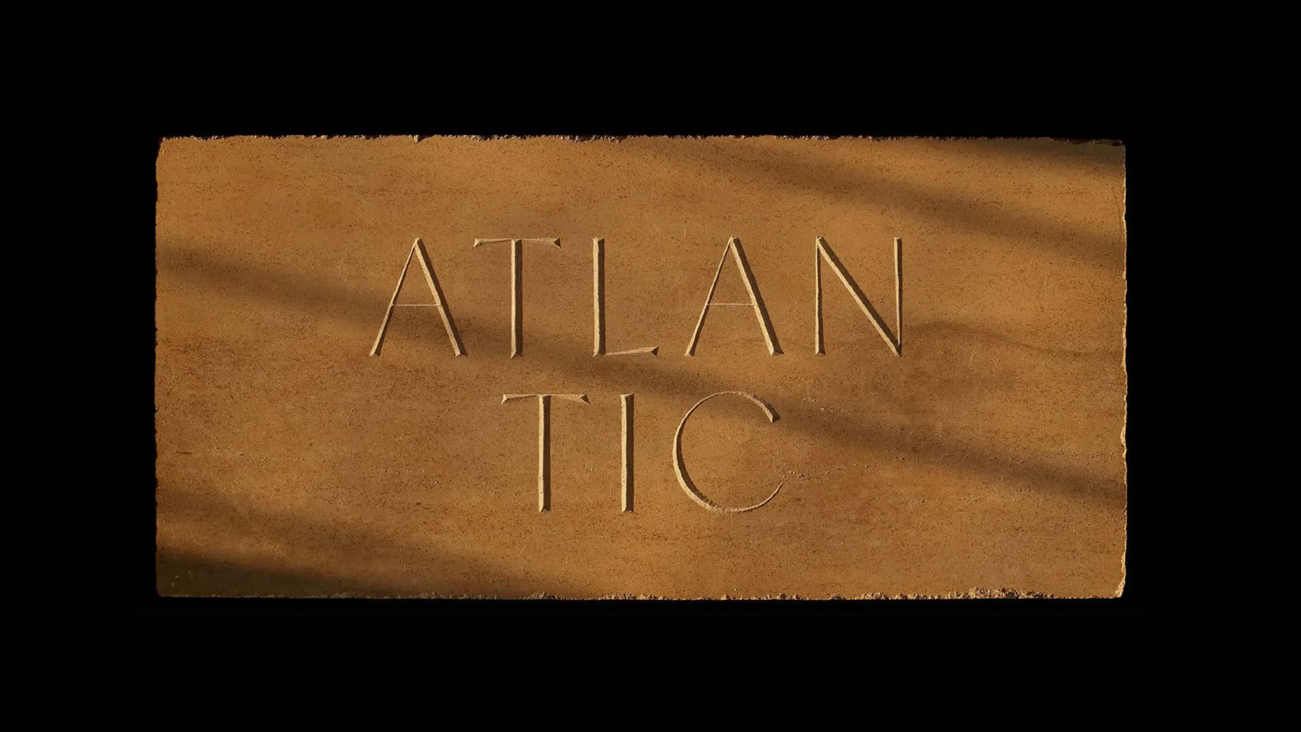 ATLANTIC engraved in wood